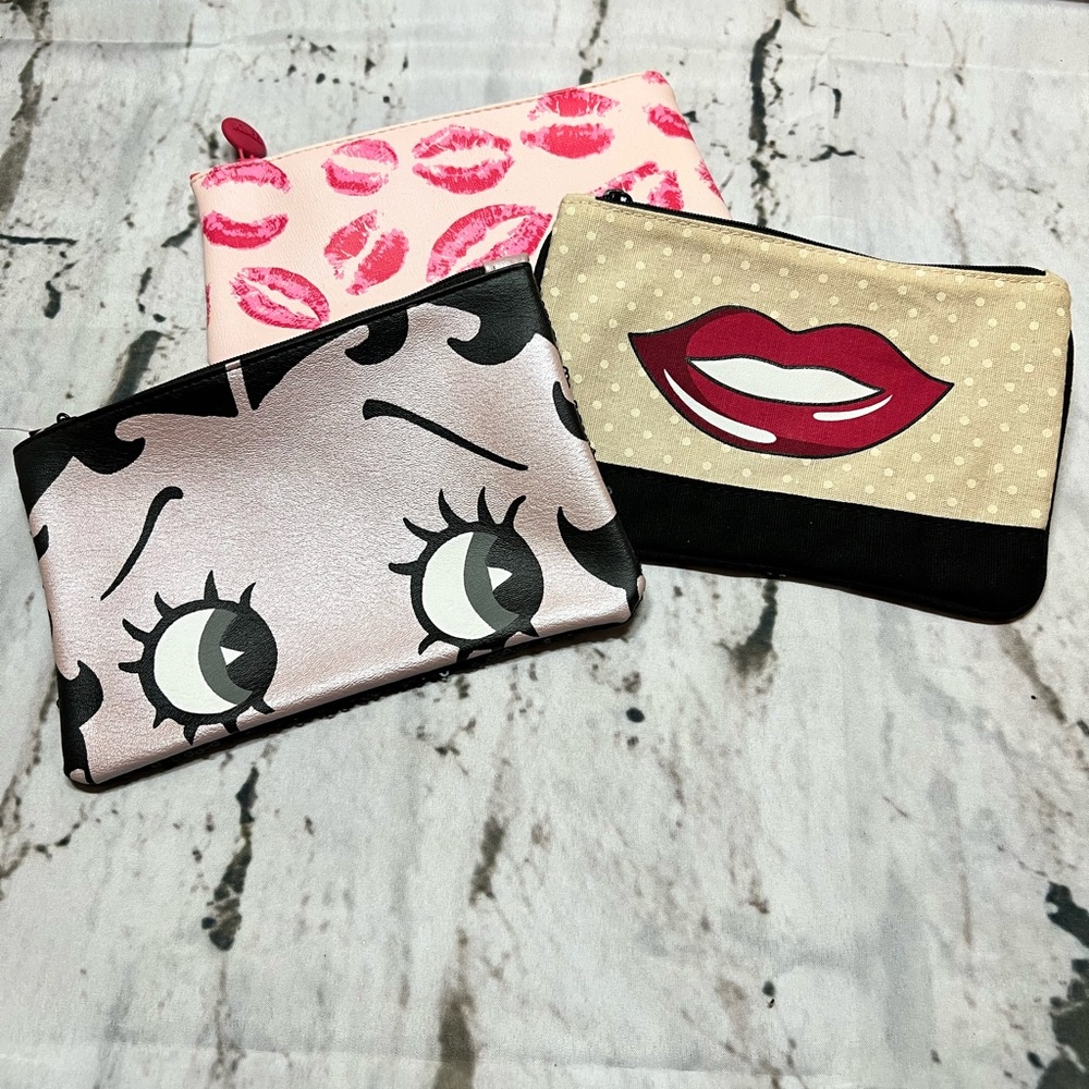 Set of Three Lip and Eye Design Pouches‎
